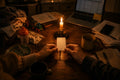 Hands holding a Kitchen Table Date card by candlelight amid family chaos